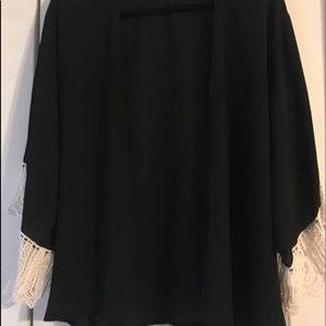 Black kimono with white embellishment on sleeves